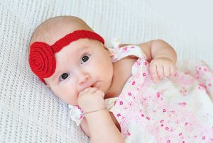 cute 4 month old girl in a dress